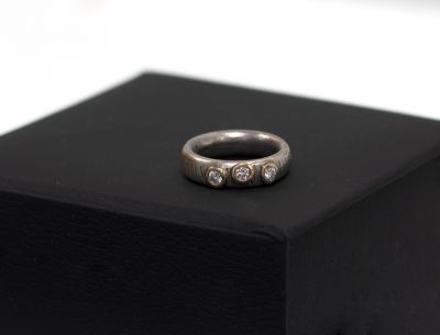 oxidised silver and gold and moissanite ring by ruth hollick