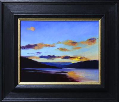 sunrise in oranges and blues by andrew sinclair